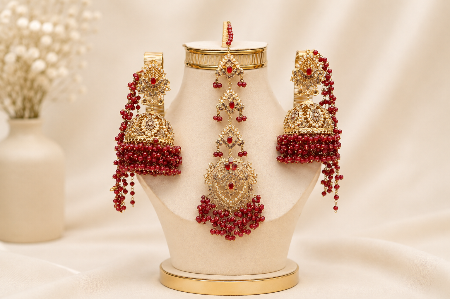 Deep Red Gold-Plated Bahubali Jhumka and Multi-Tiered Maang Tikka Set