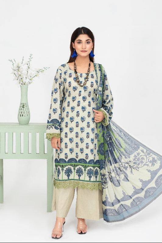 Woman wearing a floral dress with a matching dupatta in a minimalistic setting.